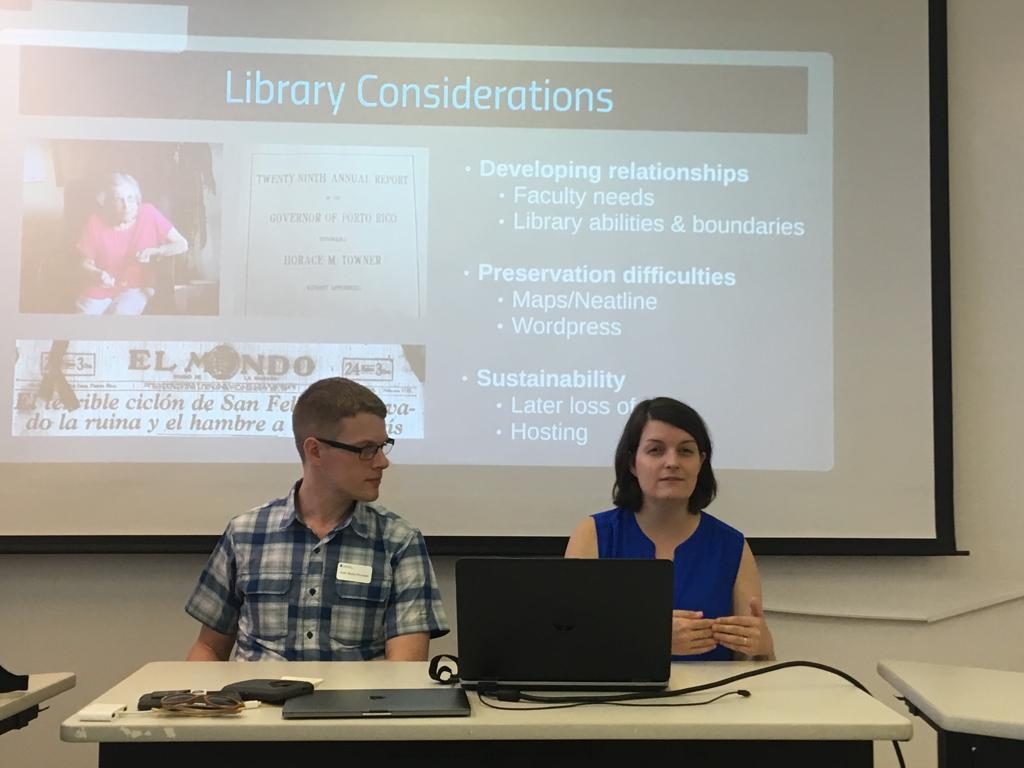 Photo of Christina Boyles and Andrew Petersen presenting their conference "Digital Humanities and Hurricane María" at UPR-Río Piedras (2019)